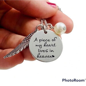 “A piece of my heart lives in heaven" necklace
